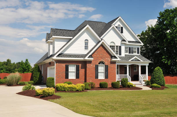 Well-maintained home exterior showcasing siding and trim work